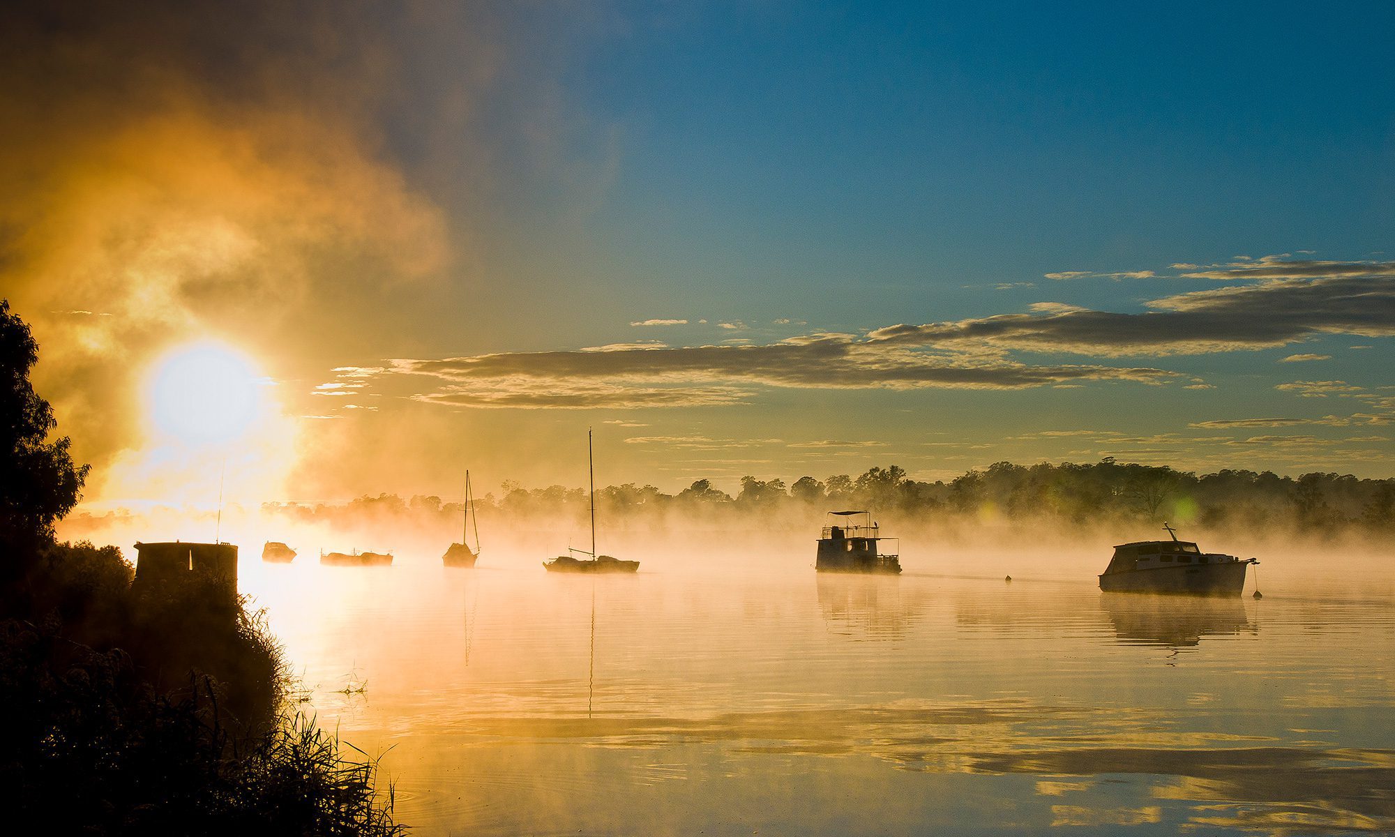 Boats at sunrise in Maclean