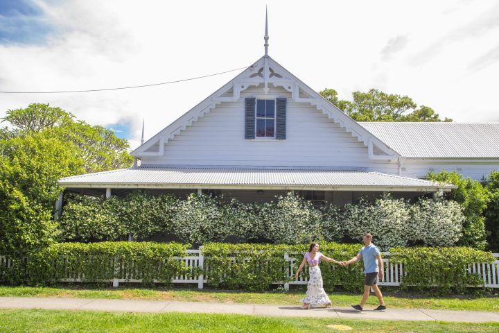 Couple enjoying a walk through the streets of Grafton in Spring.